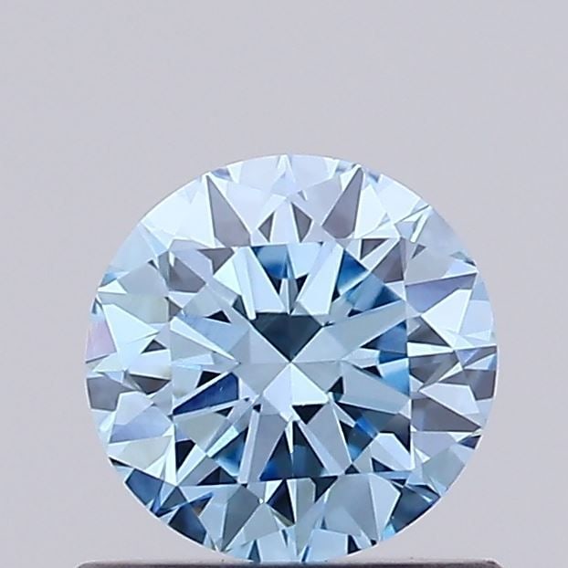 Loose Diamond - ROUND 0.92ct Fancy Vivid Blue VVS2: Loose Diamond - ROUND 0.92ct Fancy Vivid Blue VVS2 Source: This is a real non-mined Diamond that has been grown in a lab Shape: ROUND Carats: 0.92 Color: Fancy Vivid Blue Certification: IGI Video: