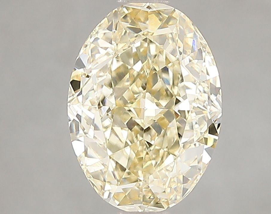 Loose Diamond - OVAL 3.03ct Fancy Yellow VS1: Loose Diamond - OVAL 3.03ct Fancy Yellow VS1 Source: This is a real non-mined Diamond that has been grown in a lab Shape: OVAL Carats: 3.03 Color: Fancy Yellow Certification: IGI Video:
