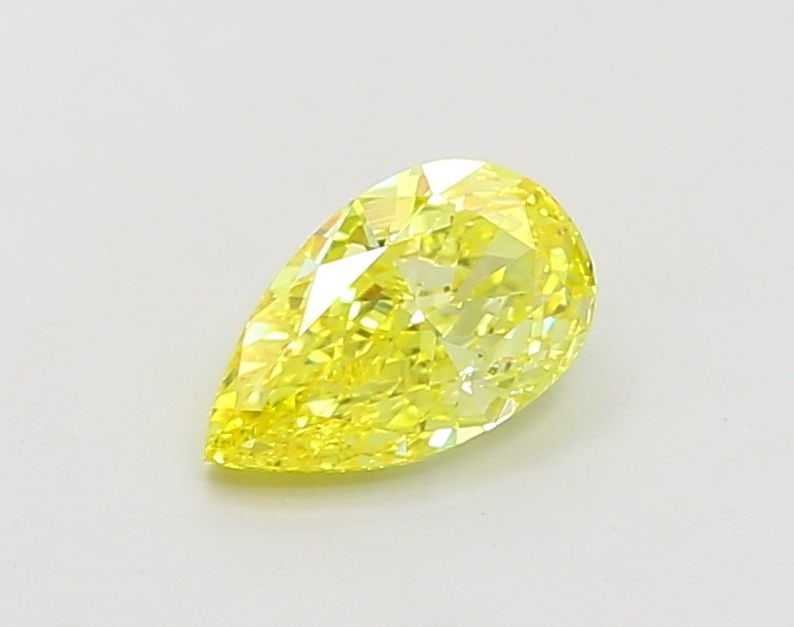 Loose Diamond - PEAR 1.0ct Fancy Vivid Yellow VS1: Loose Diamond - PEAR 1.0ct Fancy Vivid Yellow VS1 Source: This is a real non-mined Diamond that has been grown in a lab Shape: PEAR Carats: 1.0 Color: Fancy Vivid Yellow Certification: IGI Video: