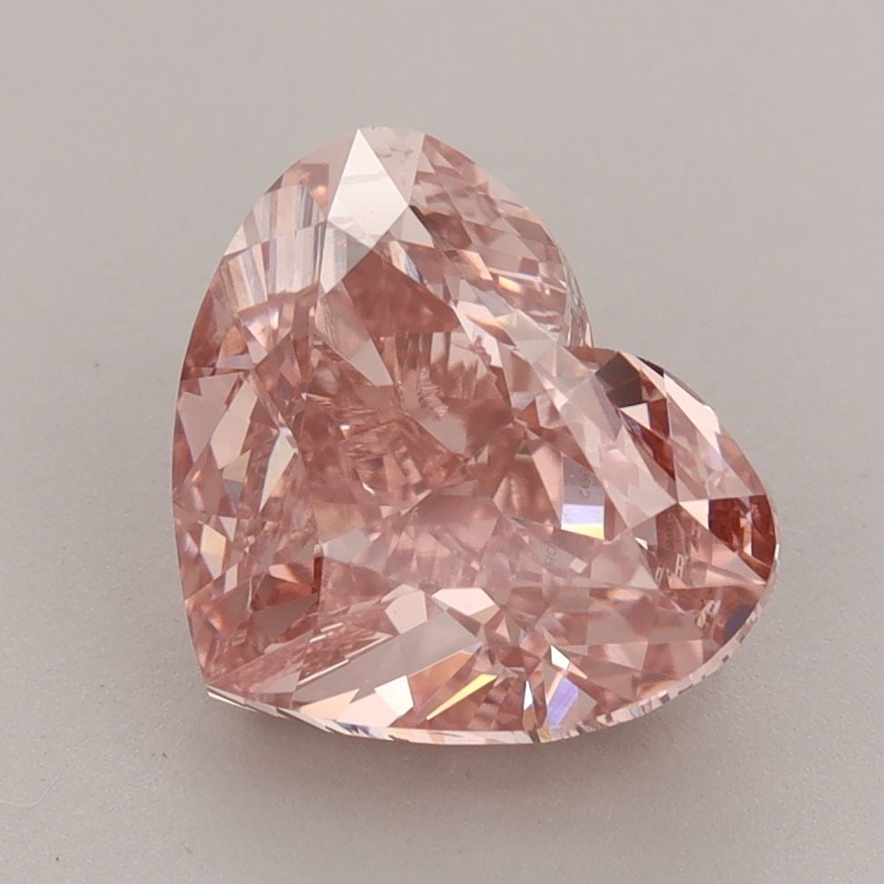 Loose Diamond - HEART 4.01ct Fancy Vivid Pink SI1: Loose Diamond - HEART 4.01ct Fancy Vivid Pink SI1 Source: This is a real non-mined Diamond that has been grown in a lab Shape: HEART Carats: 4.01 Color: Fancy Vivid Pink Certification: IGI Video: