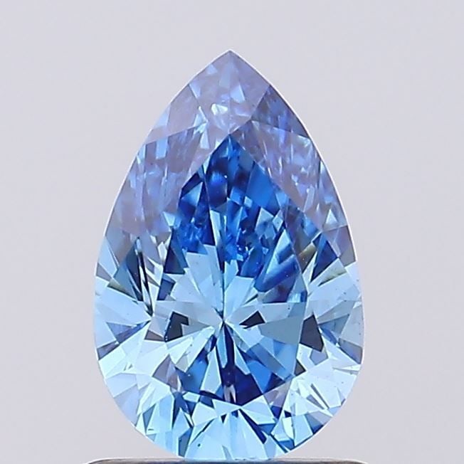 Loose Diamond - PEAR 0.99ct Fancy Vivid Blue VS1: Loose Diamond - PEAR 0.99ct Fancy Vivid Blue VS1 Source: This is a real non-mined Diamond that has been grown in a lab Shape: PEAR Carats: 0.99 Color: Fancy Vivid Blue Certification: IGI Video: