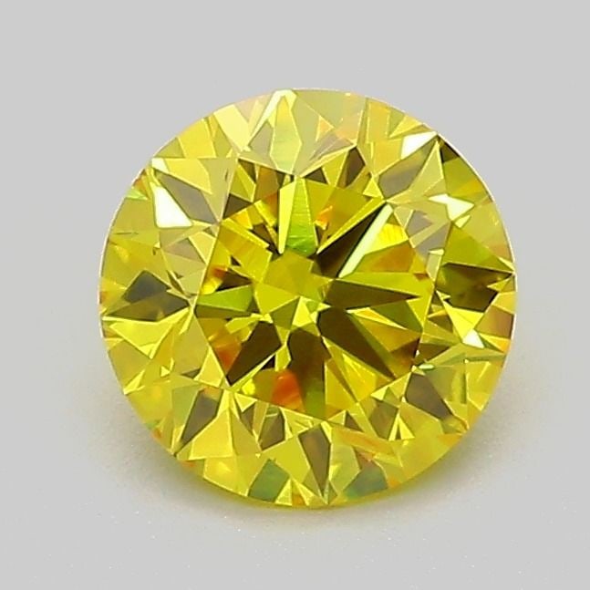 Loose Diamond - ROUND 1.03ct Fancy Vivid Yellow VVS2: Loose Diamond - ROUND 1.03ct Fancy Vivid Yellow VVS2 Source: This is a real non-mined Diamond that has been grown in a lab Shape: ROUND Carats: 1.03 Color: Fancy Vivid Yellow Certification: IGI Video: