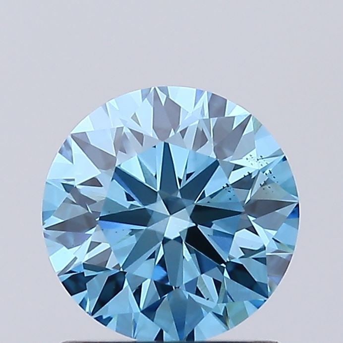 Ideal Loose Diamond - ROUND 1.03ct Fancy Vivid Blue VS2: Ideal Loose Diamond - ROUND 1.03ct Fancy Vivid Blue VS2 Source: This is a real non-mined Diamond that has been grown in a lab Shape: ROUND Carats: 1.03 Color: Fancy Vivid Blue Certification: IGI Video