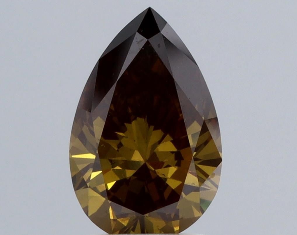 Loose Diamond - PEAR 1.53ct Brown VS2: Loose Diamond - PEAR 1.53ct Brown VS2 Source: This is a real non-mined Diamond that has been grown in a lab Shape: PEAR Carats: 1.53 Color: Brown Certification: NONE Video: