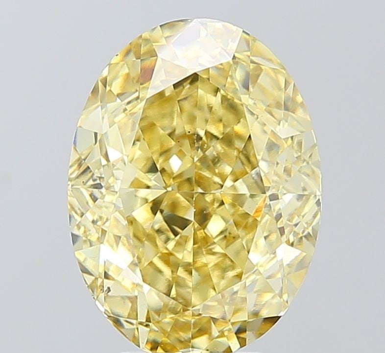 Loose Diamond - OVAL 5.06ct Fancy Intense Yellow VS2: Loose Diamond - OVAL 5.06ct Fancy Intense Yellow VS2 Source: This is a real non-mined Diamond that has been grown in a lab Shape: OVAL Carats: 5.06 Color: Fancy Intense Yellow Certification: IGI Video