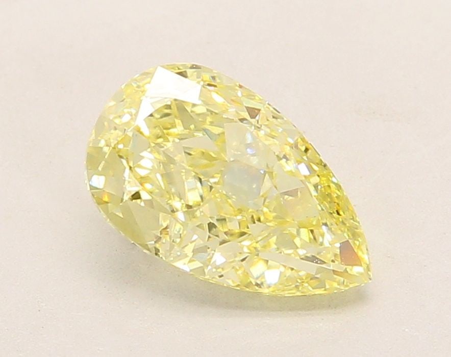 Loose Diamond - PEAR 2.14ct Fancy Intense Yellow VVS2: Loose Diamond - PEAR 2.14ct Fancy Intense Yellow VVS2 Source: This is a real non-mined Diamond that has been grown in a lab Shape: PEAR Carats: 2.14 Color: Fancy Intense Yellow Certification: IGI Vide