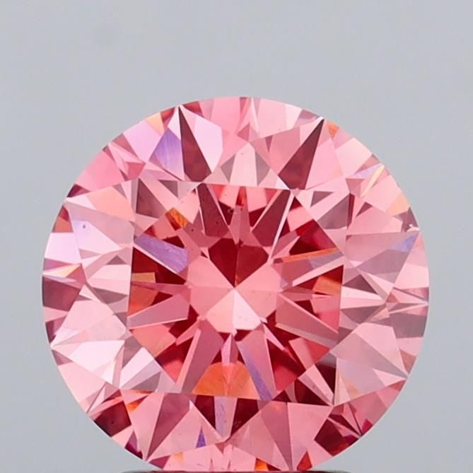 Ideal Loose Diamond - ROUND 2.52ct Fancy Vivid Pink VS2: Ideal Loose Diamond - ROUND 2.52ct Fancy Vivid Pink VS2 Source: This is a real non-mined Diamond that has been grown in a lab Shape: ROUND Carats: 2.52 Color: Fancy Vivid Pink Certification: IGI Video