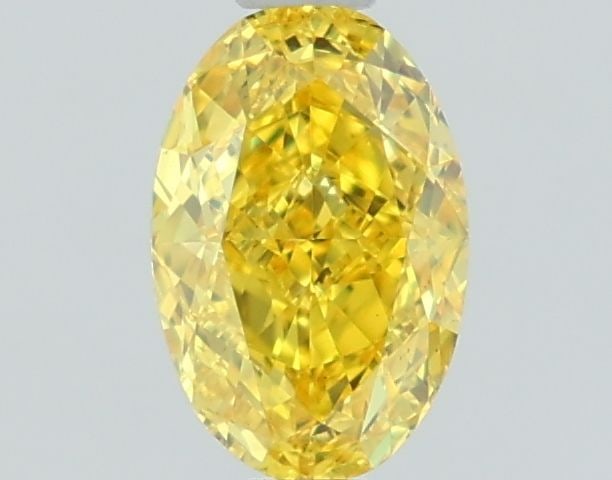 Loose Diamond - OVAL 1.03ct Fancy Vivid Yellow VVS2: Loose Diamond - OVAL 1.03ct Fancy Vivid Yellow VVS2 Source: This is a real non-mined Diamond that has been grown in a lab Shape: OVAL Carats: 1.03 Color: Fancy Vivid Yellow Certification: IGI Video: