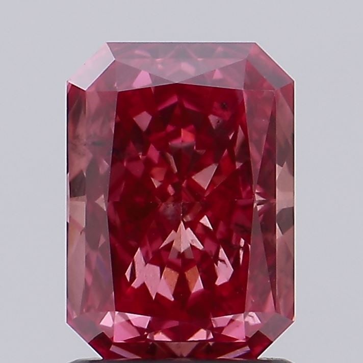 Loose Diamond - RADIANT 1.6ct Fancy Vivid Pink SI1: Loose Diamond - RADIANT 1.6ct Fancy Vivid Pink SI1 Source: This is a real non-mined Diamond that has been grown in a lab Shape: RADIANT Carats: 1.6 Color: Fancy Vivid Pink Certification: IGI Video: