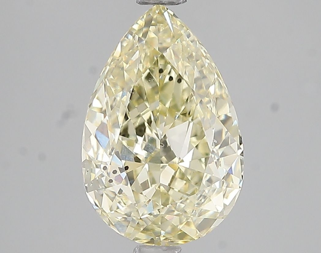 Loose Diamond - PEAR 3.02ct Fancy Light Yellow SI1: Loose Diamond - PEAR 3.02ct Fancy Light Yellow SI1 Source: This is a real non-mined Diamond that has been grown in a lab Shape: PEAR Carats: 3.02 Color: Fancy Light Yellow Certification: IGI Video: