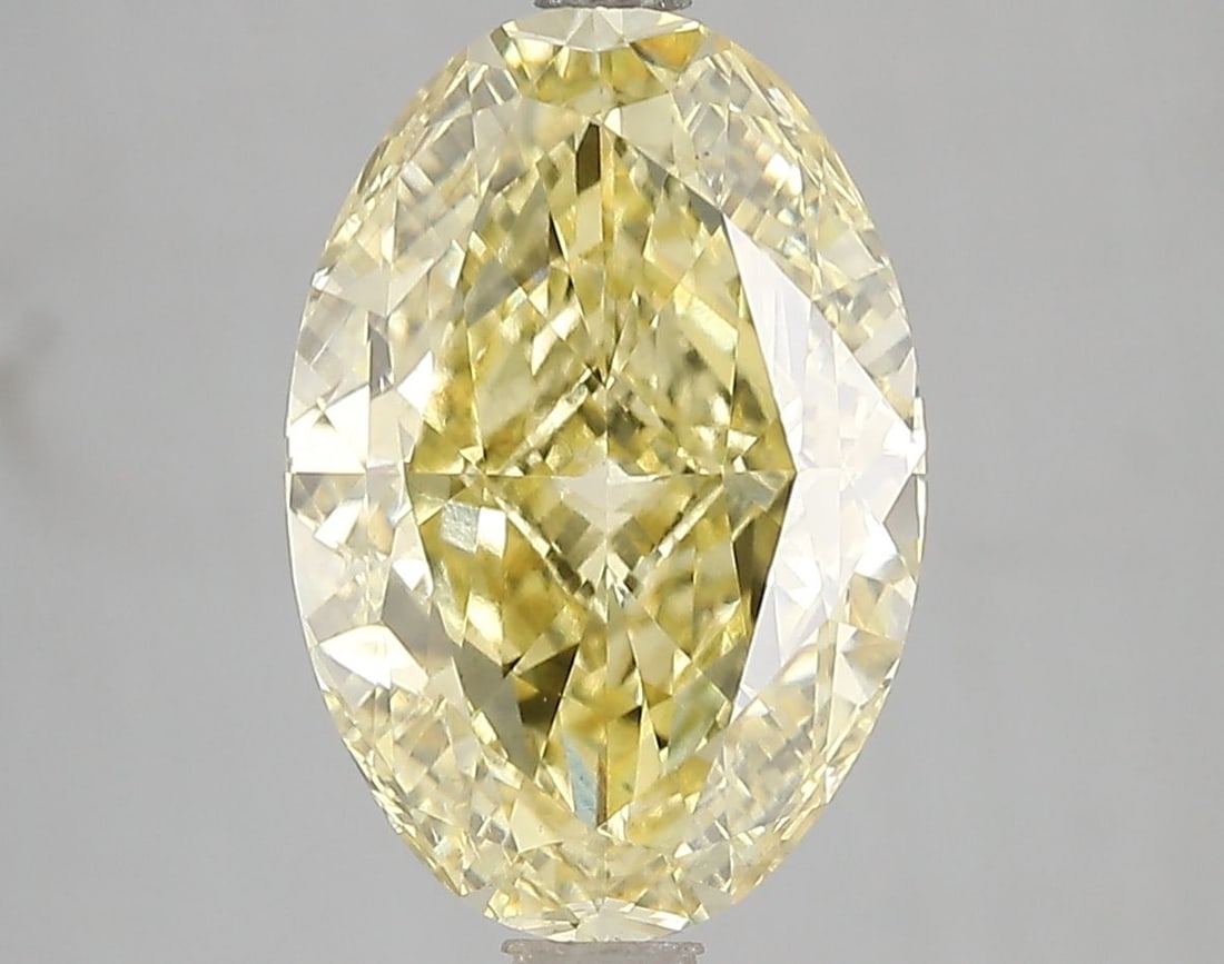 Loose Diamond - OVAL 5.0ct Fancy Vivid Yellow VS2: Loose Diamond - OVAL 5.0ct Fancy Vivid Yellow VS2 Source: This is a real non-mined Diamond that has been grown in a lab Shape: OVAL Carats: 5.0 Color: Fancy Vivid Yellow Certification: IGI Video: