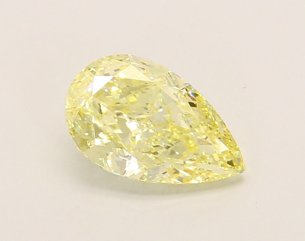 Loose Diamond - PEAR 1.76ct Fancy Yellow VVS2: Loose Diamond - PEAR 1.76ct Fancy Yellow VVS2 Source: This is a real non-mined Diamond that has been grown in a lab Shape: PEAR Carats: 1.76 Color: Fancy Yellow Certification: IGI Video: