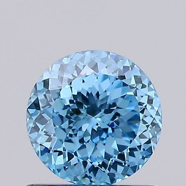 Loose Diamond - ROUND 0.97ct Fancy Vivid Blue VS2: Loose Diamond - ROUND 0.97ct Fancy Vivid Blue VS2 Source: This is a real non-mined Diamond that has been grown in a lab Shape: ROUND Carats: 0.97 Color: Fancy Vivid Blue Certification: IGI Video: