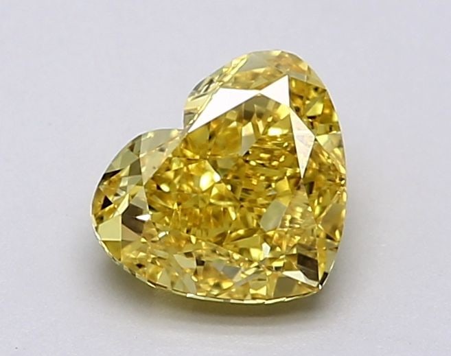 Loose Diamond - HEART 1.5ct Fancy Vivid Yellow VVS1: Loose Diamond - HEART 1.5ct Fancy Vivid Yellow VVS1 Source: This is a real non-mined Diamond that has been grown in a lab Shape: HEART Carats: 1.5 Color: Fancy Vivid Yellow Certification: IGI Video: