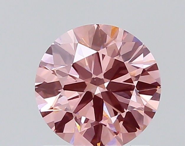 Loose Diamond - ROUND 0.82ct Fancy Vivid Pink VS1: Loose Diamond - ROUND 0.82ct Fancy Vivid Pink VS1 Source: This is a real non-mined Diamond that has been grown in a lab Shape: ROUND Carats: 0.82 Color: Fancy Vivid Pink Certification: NONE PLEASE NOT