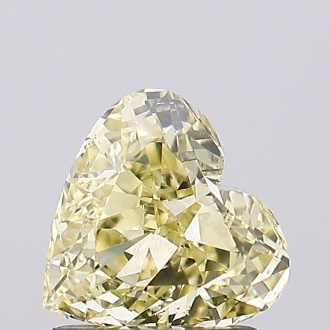 Loose Diamond - HEART 1.08ct Fancy Light Yellow VS1: Loose Diamond - HEART 1.08ct Fancy Light Yellow VS1 Source: This is a real non-mined Diamond that has been grown in a lab Shape: HEART Carats: 1.08 Color: Fancy Light Yellow Certification: IGI Video: