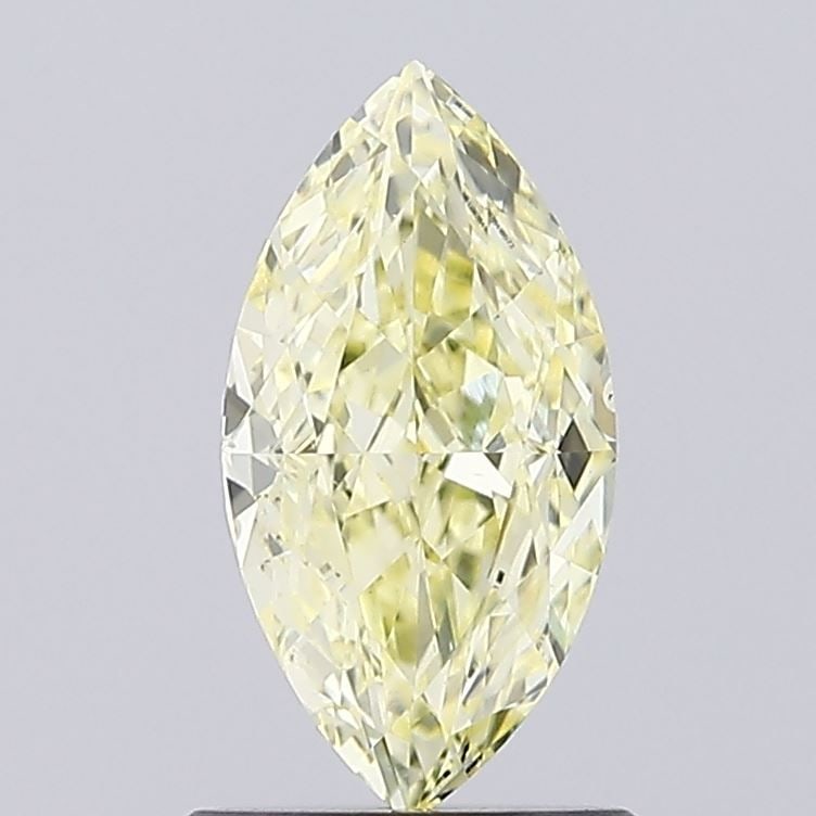 Loose Diamond - MARQUISE 0.96ct Fancy Yellow VS1: Loose Diamond - MARQUISE 0.96ct Fancy Yellow VS1 Source: This is a real non-mined Diamond that has been grown in a lab Shape: MARQUISE Carats: 0.96 Color: Fancy Yellow Certification: IGI Video: