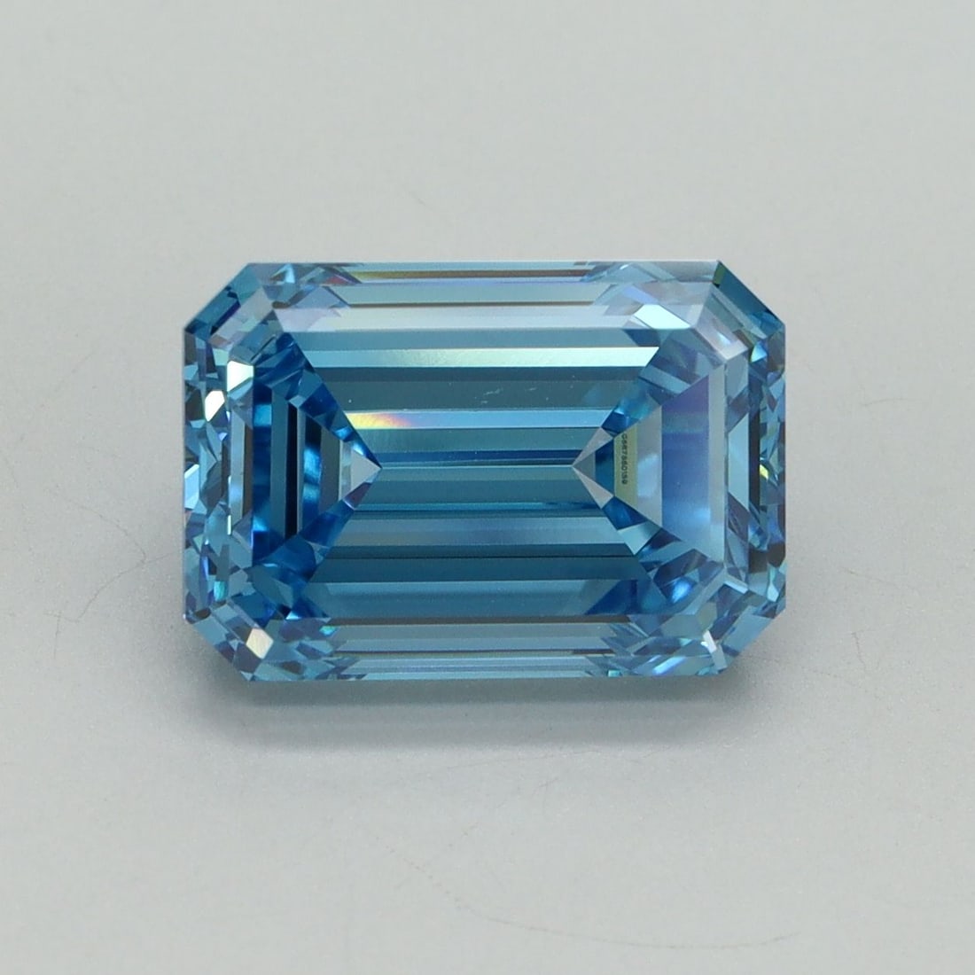 Loose Diamond - EMERALD 4.17ct Fancy Vivid Blue VS1: Loose Diamond - EMERALD 4.17ct Fancy Vivid Blue VS1 Source: This is a real non-mined Diamond that has been grown in a lab Shape: EMERALD Carats: 4.17 Color: Fancy Vivid Blue Certification: IGI Video: