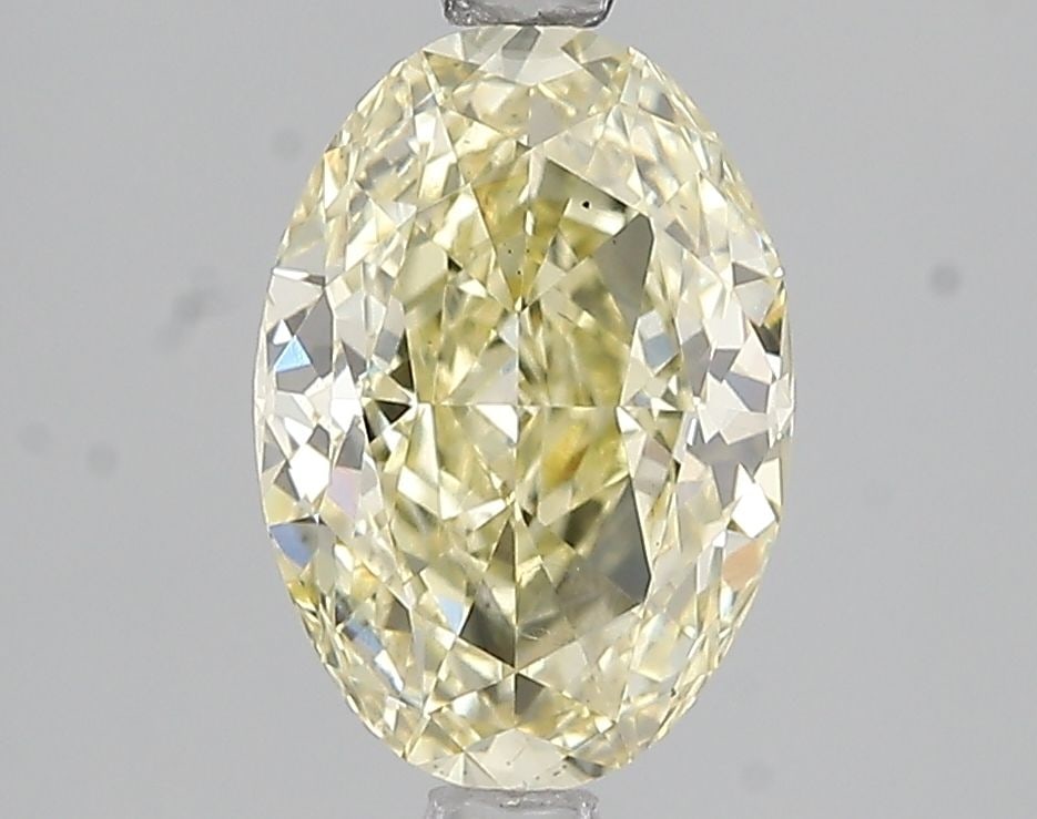 Loose Diamond - OVAL 2.02ct Fancy Yellow VS1: Loose Diamond - OVAL 2.02ct Fancy Yellow VS1 Source: This is a real non-mined Diamond that has been grown in a lab Shape: OVAL Carats: 2.02 Color: Fancy Yellow Certification: IGI Video: