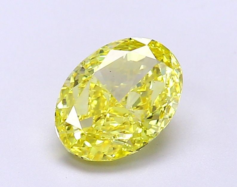 Loose Diamond - OVAL 1.52ct Fancy Vivid Yellow VS1: Loose Diamond - OVAL 1.52ct Fancy Vivid Yellow VS1 Source: This is a real non-mined Diamond that has been grown in a lab Shape: OVAL Carats: 1.52 Color: Fancy Vivid Yellow Certification: IGI Video: