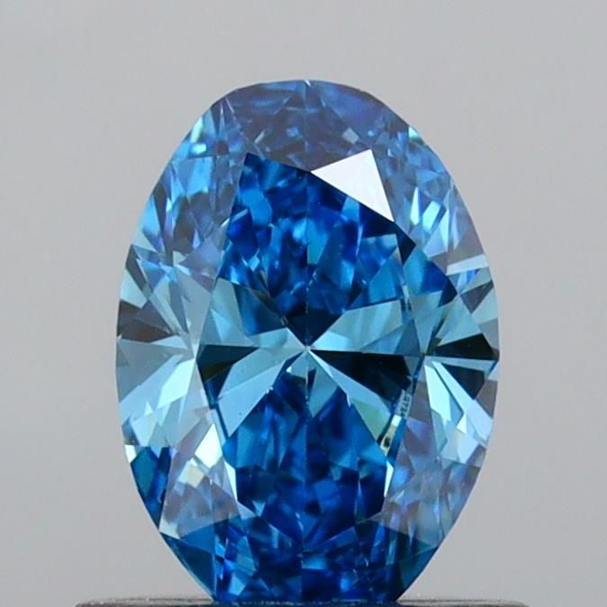 Loose Diamond - OVAL 0.66ct Fancy Vivid Blue VS1: Loose Diamond - OVAL 0.66ct Fancy Vivid Blue VS1 Source: This is a real non-mined Diamond that has been grown in a lab Shape: OVAL Carats: 0.66 Color: Fancy Vivid Blue Certification: IGI Video: