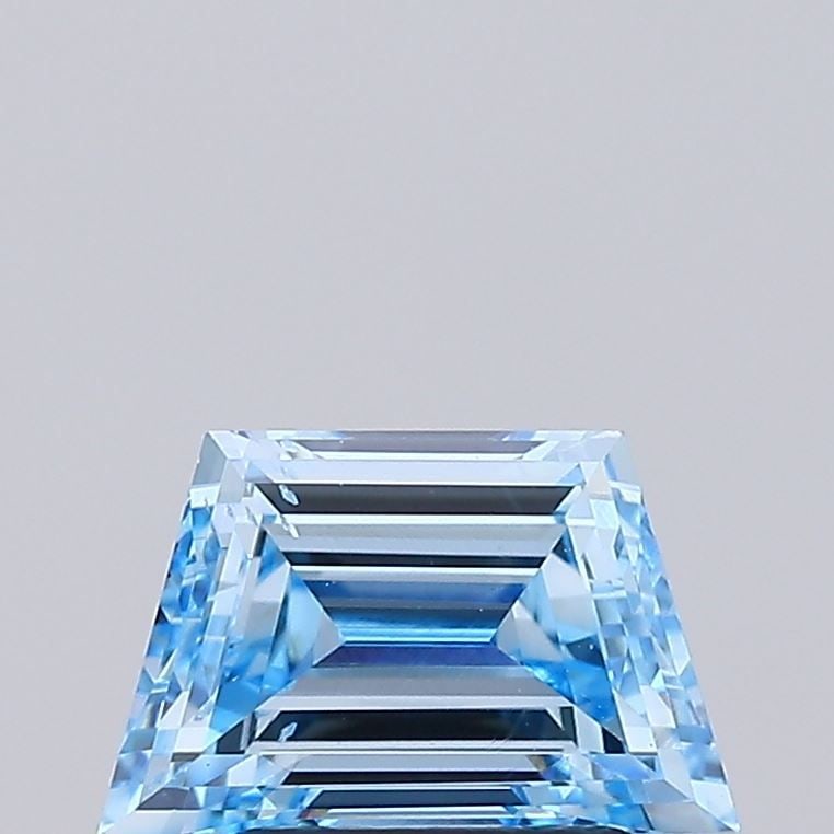 Loose Diamond - TRAPEZOID 0.54ct Fancy Vivid Blue VS1: Loose Diamond - TRAPEZOID 0.54ct Fancy Vivid Blue VS1 Source: This is a real non-mined Diamond that has been grown in a lab Shape: TRAPEZOID Carats: 0.54 Color: Fancy Vivid Blue Certification: NONE Vi