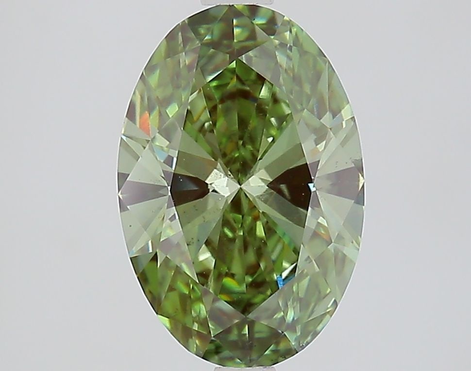 Loose Diamond - OVAL 2.1ct Fancy Vivid Green VS2: Loose Diamond - OVAL 2.1ct Fancy Vivid Green VS2 Source: This is a real non-mined Diamond that has been grown in a lab Shape: OVAL Carats: 2.1 Color: Fancy Vivid Green Certification: IGI Video: