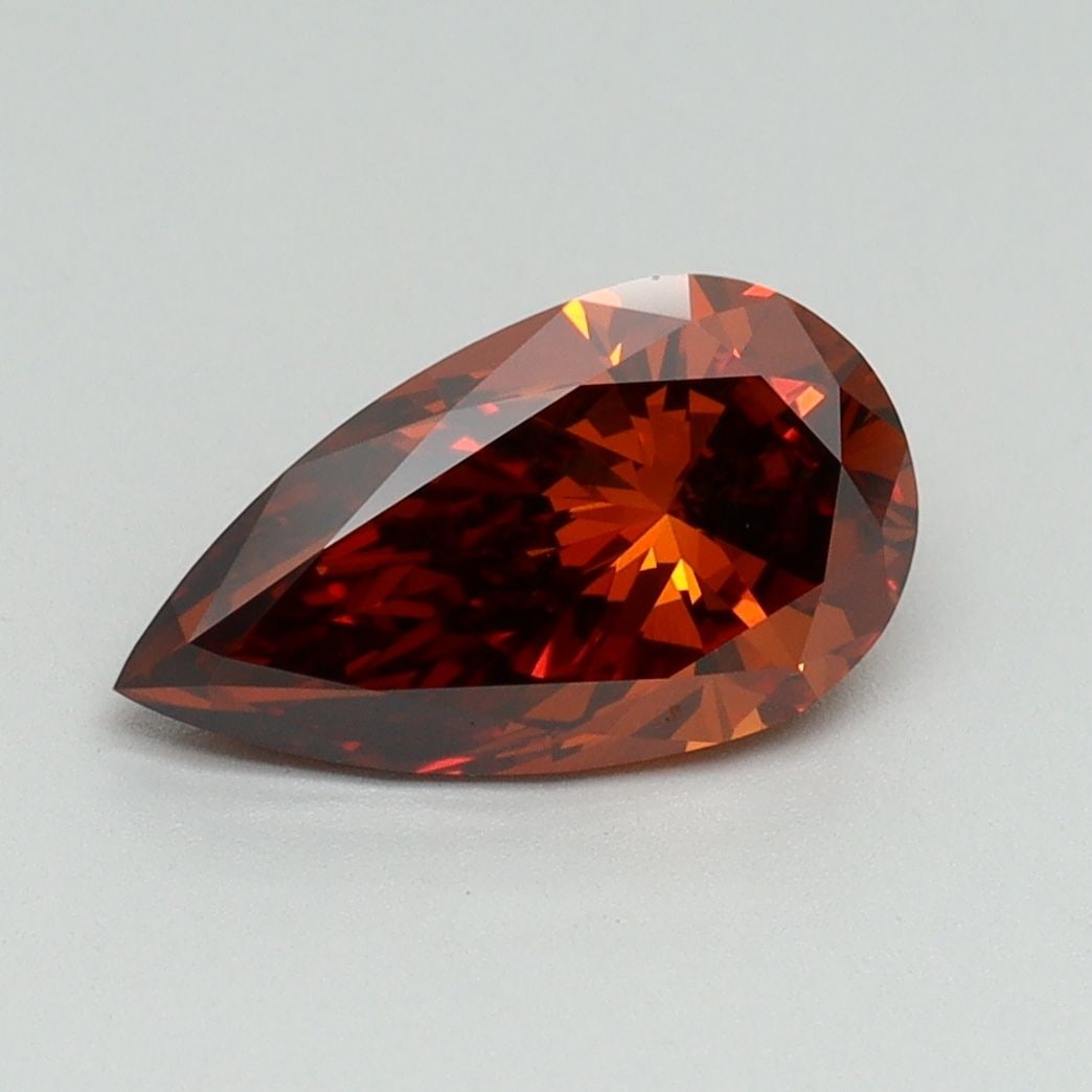 Loose Diamond - PEAR 1.58ct Fancy Deep Orange VVS2: Loose Diamond - PEAR 1.58ct Fancy Deep Orange VVS2 Source: This is a real non-mined Diamond that has been grown in a lab Shape: PEAR Carats: 1.58 Color: Fancy Deep Orange Certification: IGI Video: