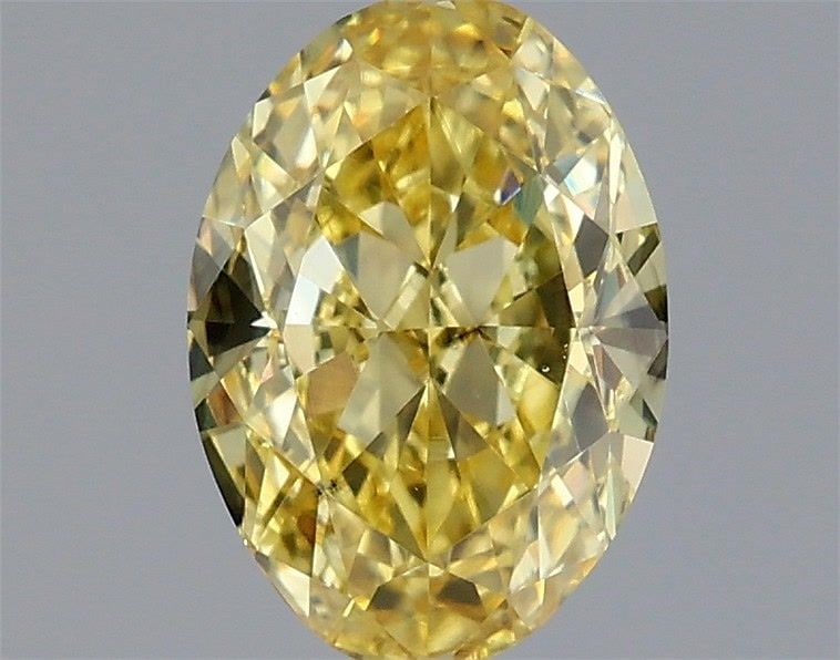 Loose Diamond - OVAL 0.9ct Fancy Intense Yellow VS1: Loose Diamond - OVAL 0.9ct Fancy Intense Yellow VS1 Source: This is a real non-mined Diamond that has been grown in a lab Shape: OVAL Carats: 0.9 Color: Fancy Intense Yellow Certification: IGI Video: