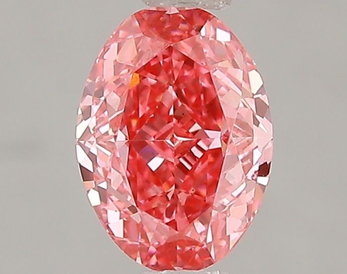 Loose Diamond - OVAL 1.07ct Fancy Vivid Pink VS1: Loose Diamond - OVAL 1.07ct Fancy Vivid Pink VS1 Source: This is a real non-mined Diamond that has been grown in a lab Shape: OVAL Carats: 1.07 Color: Fancy Vivid Pink Certification: IGI Video:
