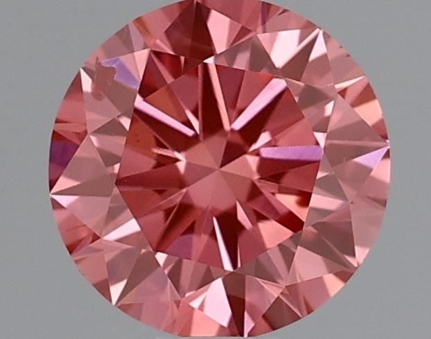 Loose Diamond - ROUND 0.6ct Fancy Vivid Pink SI2: Loose Diamond - ROUND 0.6ct Fancy Vivid Pink SI2 Source: This is a real non-mined Diamond that has been grown in a lab Shape: ROUND Carats: 0.6 Color: Fancy Vivid Pink Certification: IGI Video: