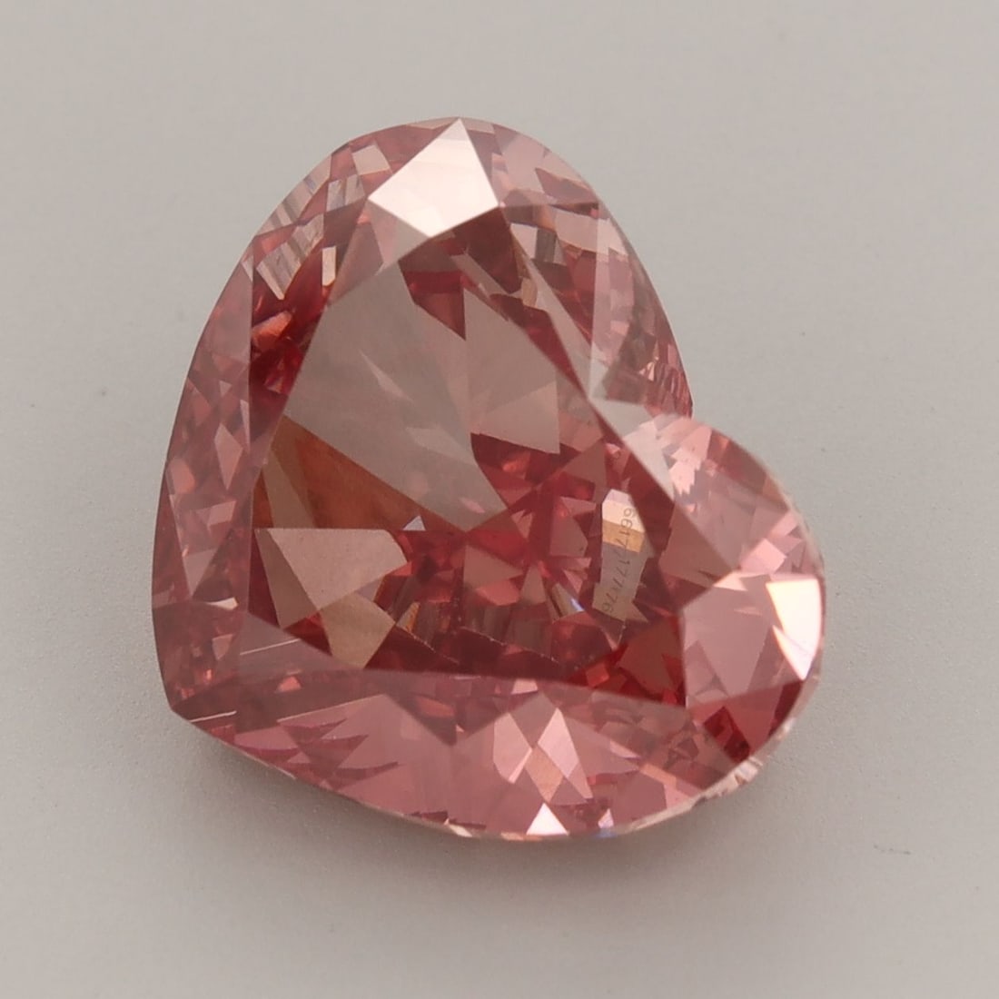 Loose Diamond - HEART 7.79ct Fancy Vivid Pink VS1: Loose Diamond - HEART 7.79ct Fancy Vivid Pink VS1 Source: This is a real non-mined Diamond that has been grown in a lab Shape: HEART Carats: 7.79 Color: Fancy Vivid Pink Certification: IGI PLEASE NOTE