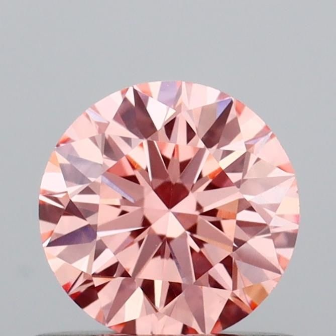 Ideal Loose Diamond - ROUND 0.64ct Fancy Intense Pink VS1: Ideal Loose Diamond - ROUND 0.64ct Fancy Intense Pink VS1 Source: This is a real non-mined Diamond that has been grown in a lab Shape: ROUND Carats: 0.64 Color: Fancy Intense Pink Certification: IGI V