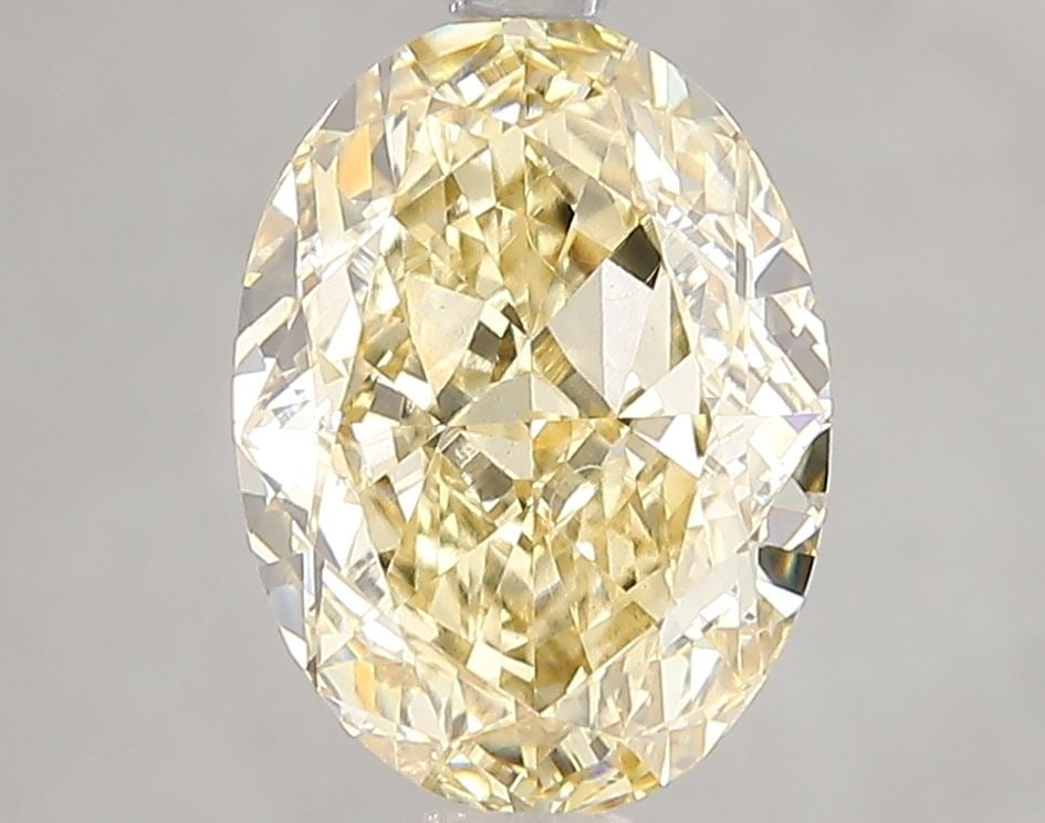 Loose Diamond - OVAL 3.07ct Fancy Intense Yellow VS1: Loose Diamond - OVAL 3.07ct Fancy Intense Yellow VS1 Source: This is a real non-mined Diamond that has been grown in a lab Shape: OVAL Carats: 3.07 Color: Fancy Intense Yellow Certification: IGI Video