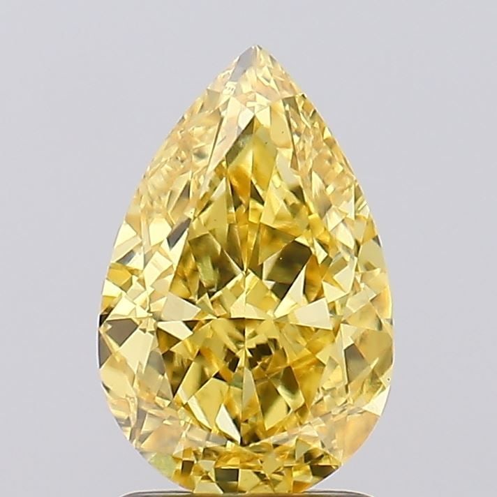 Loose Diamond - PEAR 2.0ct Fancy Vivid Yellow VS1: Loose Diamond - PEAR 2.0ct Fancy Vivid Yellow VS1 Source: This is a real non-mined Diamond that has been grown in a lab Shape: PEAR Carats: 2.0 Color: Fancy Vivid Yellow Certification: IGI Video: