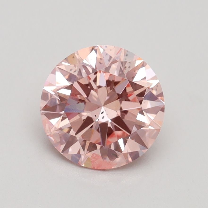 Loose Diamond - ROUND 1.3ct Fancy Intense Pink SI2: Loose Diamond - ROUND 1.3ct Fancy Intense Pink SI2 Source: This is a real non-mined Diamond that has been grown in a lab Shape: ROUND Carats: 1.3 Color: Fancy Intense Pink Certification: IGI Video: