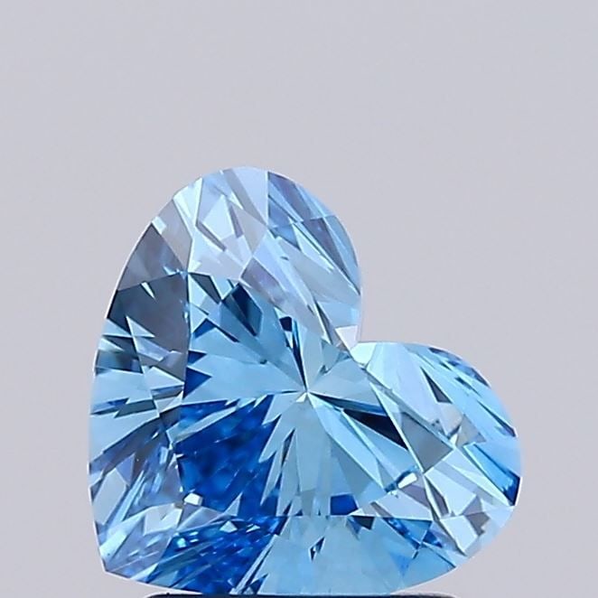 Loose Diamond - HEART 1.54ct Fancy Vivid Blue VS1: Loose Diamond - HEART 1.54ct Fancy Vivid Blue VS1 Source: This is a real non-mined Diamond that has been grown in a lab Shape: HEART Carats: 1.54 Color: Fancy Vivid Blue Certification: IGI Video: