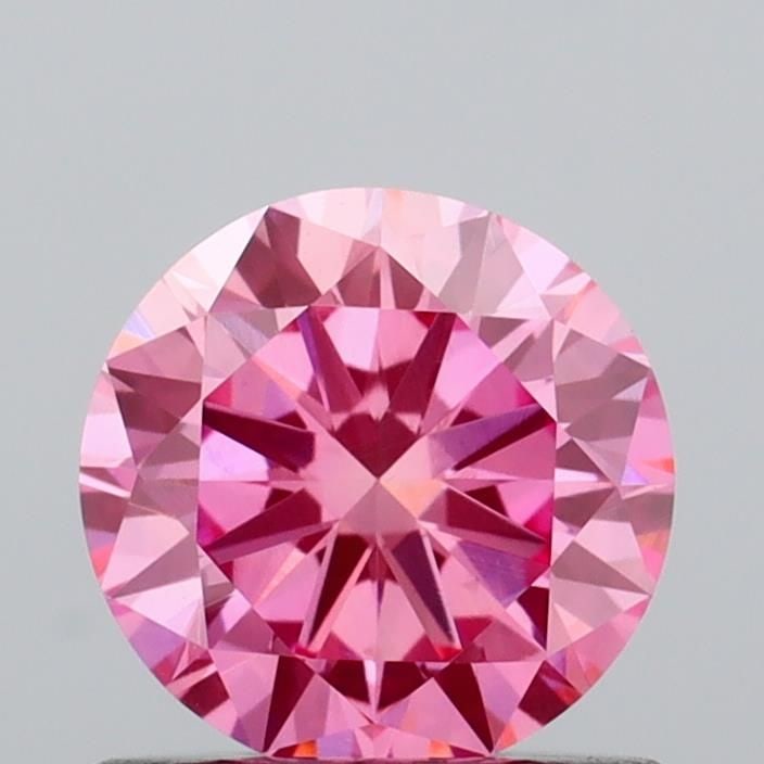 Loose Diamond - ROUND 0.72ct Fancy Vivid Pink VS1: Loose Diamond - ROUND 0.72ct Fancy Vivid Pink VS1 Source: This is a real non-mined Diamond that has been grown in a lab Shape: ROUND Carats: 0.72 Color: Fancy Vivid Pink Certification: IGI Video: