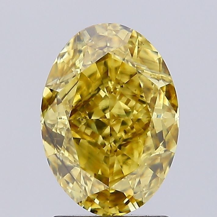 Loose Diamond - OVAL 2.11ct Fancy Vivid Yellow SI1: Loose Diamond - OVAL 2.11ct Fancy Vivid Yellow SI1 Source: This is a real non-mined Diamond that has been grown in a lab Shape: OVAL Carats: 2.11 Color: Fancy Vivid Yellow Certification: IGI Video: