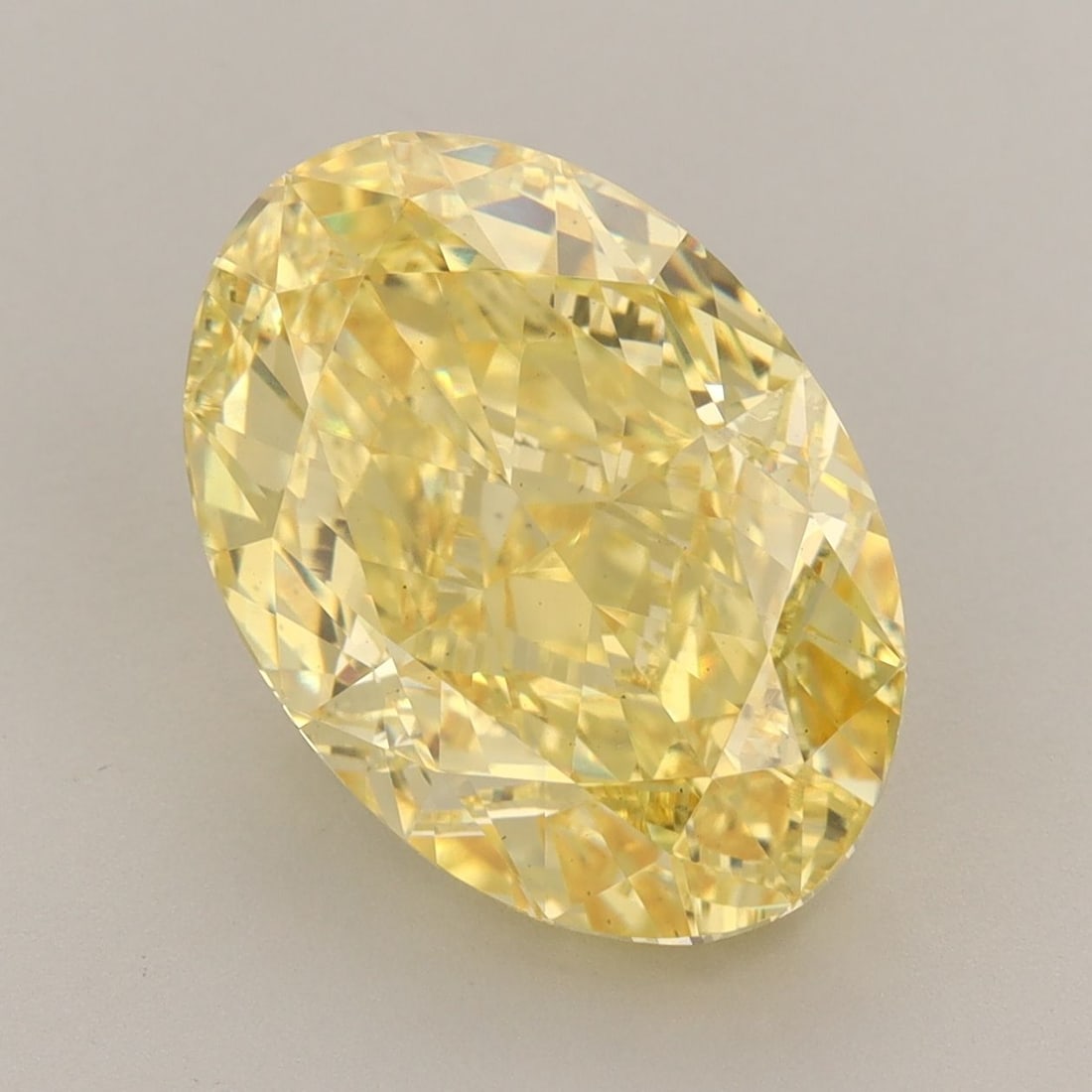 Loose Diamond - OVAL 7.2ct Fancy Vivid Yellow VS1: Loose Diamond - OVAL 7.2ct Fancy Vivid Yellow VS1 Source: This is a real non-mined Diamond that has been grown in a lab Shape: OVAL Carats: 7.2 Color: Fancy Vivid Yellow Certification: IGI Video: