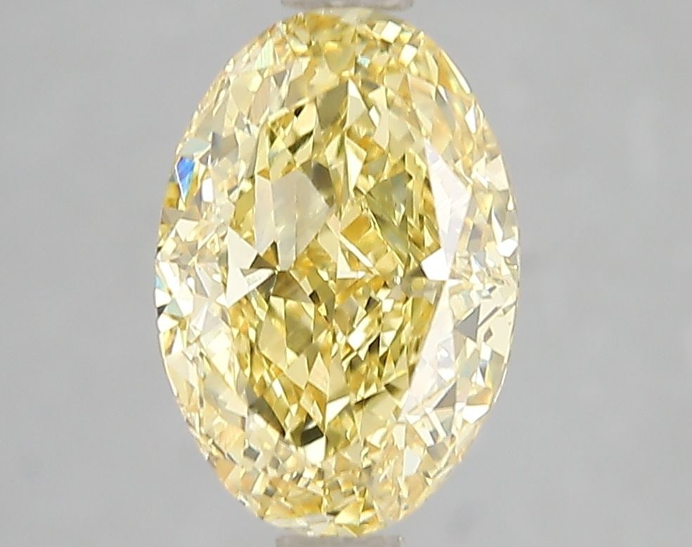 Loose Diamond - OVAL 3.0ct Fancy Vivid Yellow VS1: Loose Diamond - OVAL 3.0ct Fancy Vivid Yellow VS1 Source: This is a real non-mined Diamond that has been grown in a lab Shape: OVAL Carats: 3.0 Color: Fancy Vivid Yellow Certification: IGI Video: