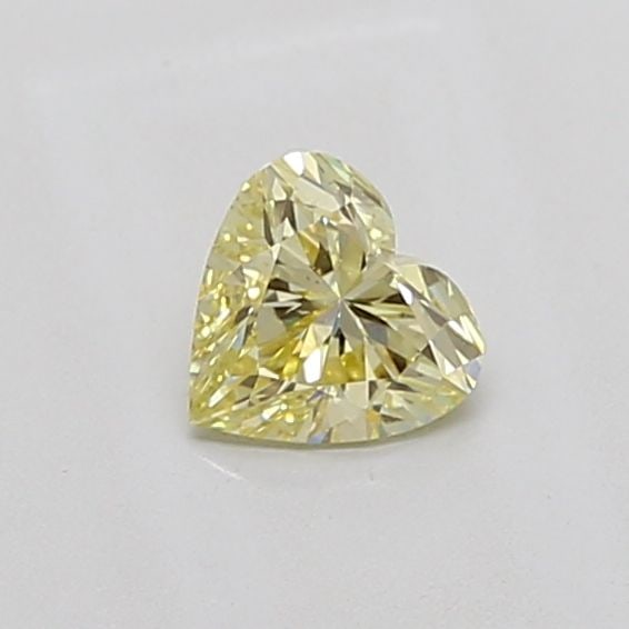Loose Diamond - HEART 0.63ct Fancy Yellow VS1: Loose Diamond - HEART 0.63ct Fancy Yellow VS1 Source: This is a real non-mined Diamond that has been grown in a lab Shape: HEART Carats: 0.63 Color: Fancy Yellow Certification: IGI Video: