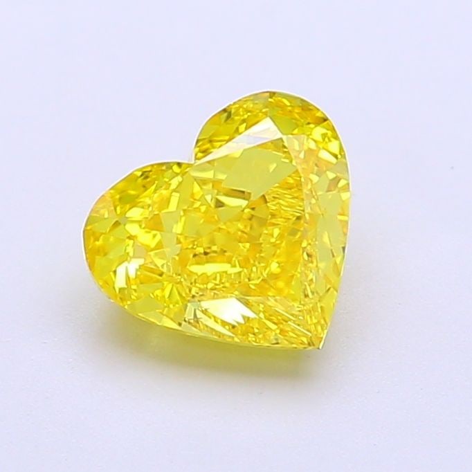Loose Diamond - HEART 1.27ct Fancy Vivid Yellow VVS2: Loose Diamond - HEART 1.27ct Fancy Vivid Yellow VVS2 Source: This is a real non-mined Diamond that has been grown in a lab Shape: HEART Carats: 1.27 Color: Fancy Vivid Yellow Certification: IGI Video: