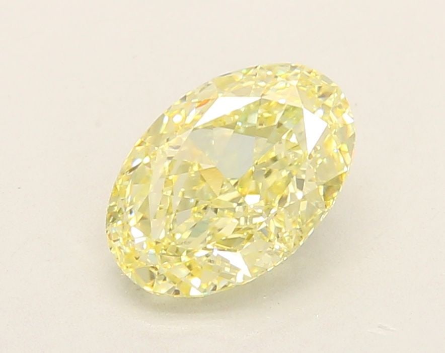 Loose Diamond - OVAL 2.07ct Fancy Yellow VS1: Loose Diamond - OVAL 2.07ct Fancy Yellow VS1 Source: This is a real non-mined Diamond that has been grown in a lab Shape: OVAL Carats: 2.07 Color: Fancy Yellow Certification: IGI Video: