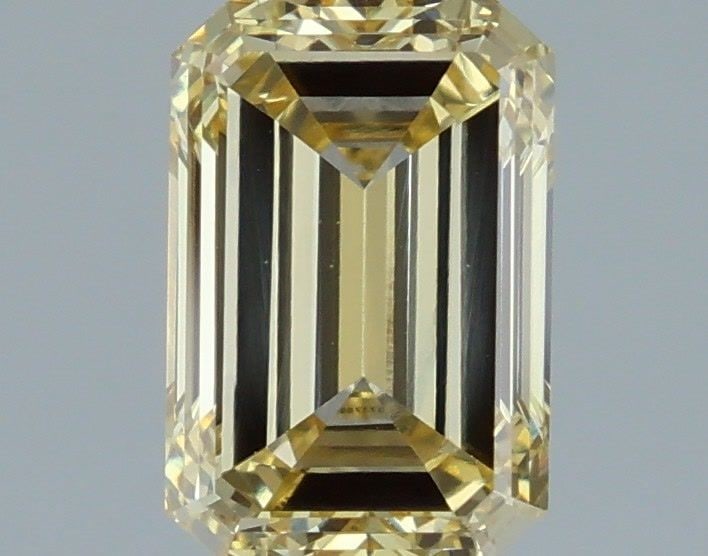 Loose Diamond - EMERALD 1.38ct Fancy Yellow VVS2: Loose Diamond - EMERALD 1.38ct Fancy Yellow VVS2 Source: This is a real non-mined Diamond that has been grown in a lab Shape: EMERALD Carats: 1.38 Color: Fancy Yellow Certification: IGI Video: