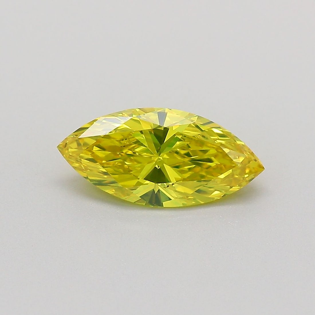 Loose Diamond - MARQUISE 1.17ct Fancy Vivid Yellow SI1: Loose Diamond - MARQUISE 1.17ct Fancy Vivid Yellow SI1 Source: This is a real non-mined Diamond that has been grown in a lab Shape: MARQUISE Carats: 1.17 Color: Fancy Vivid Yellow Certification: IGI V
