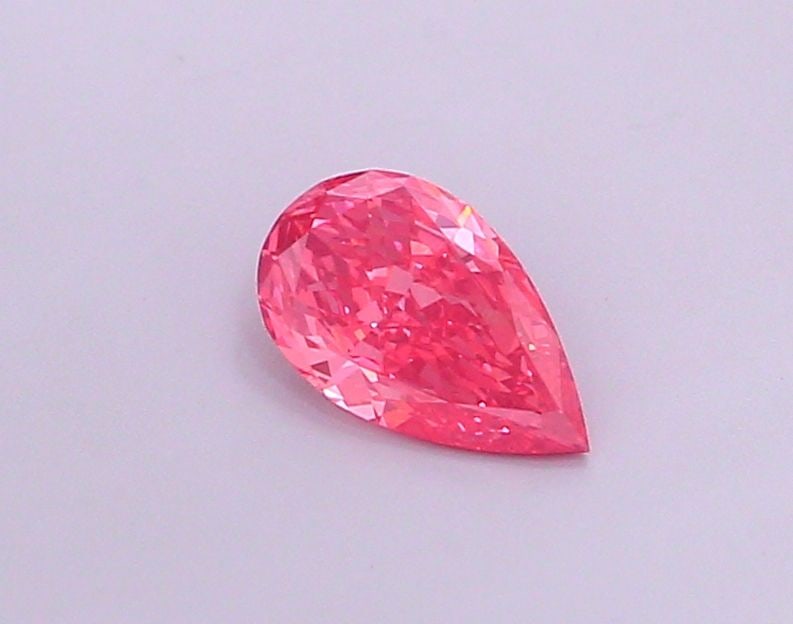 Loose Diamond - PEAR 1.01ct Fancy Vivid Pink VS1: Loose Diamond - PEAR 1.01ct Fancy Vivid Pink VS1 Source: This is a real non-mined Diamond that has been grown in a lab Shape: PEAR Carats: 1.01 Color: Fancy Vivid Pink Certification: IGI Video: