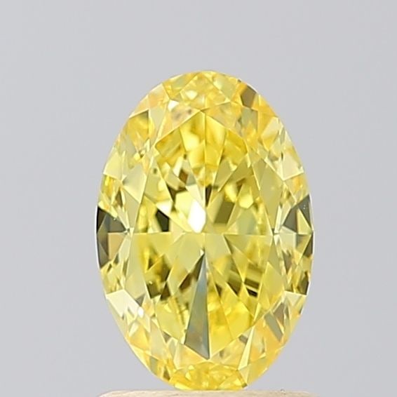 Loose Diamond - OVAL 1.5ct Fancy Vivid Yellow VS1: Loose Diamond - OVAL 1.5ct Fancy Vivid Yellow VS1 Source: This is a real non-mined Diamond that has been grown in a lab Shape: OVAL Carats: 1.5 Color: Fancy Vivid Yellow Certification: IGI Video: