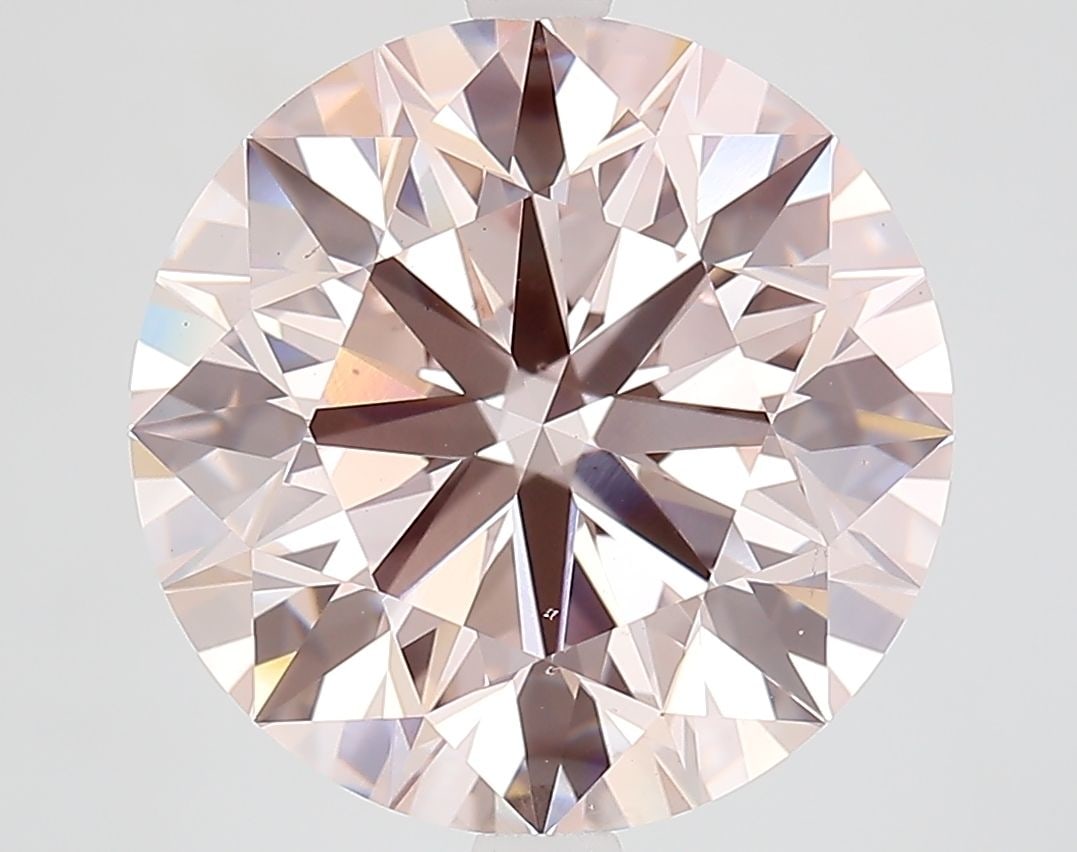 Ideal Loose Diamond - ROUND 7.01ct Fancy Pink VS2: Ideal Loose Diamond - ROUND 7.01ct Fancy Pink VS2 Source: This is a real non-mined Diamond that has been grown in a lab Shape: ROUND Carats: 7.01 Color: Fancy Pink Certification: IGI Video: