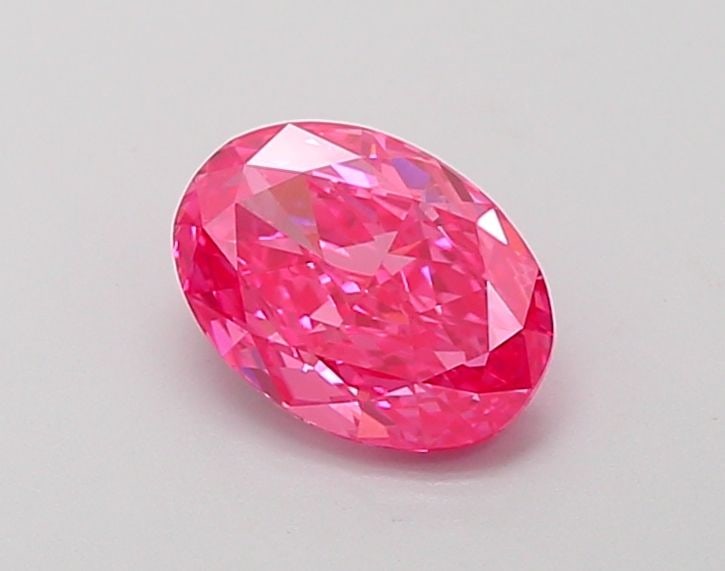 Loose Diamond - OVAL 1.03ct Fancy Vivid Pink VVS2: Loose Diamond - OVAL 1.03ct Fancy Vivid Pink VVS2 Source: This is a real non-mined Diamond that has been grown in a lab Shape: OVAL Carats: 1.03 Color: Fancy Vivid Pink Certification: IGI Video: